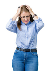 Canvas Print - Beautiful middle age mature business woman wearing glasses over isolated background suffering from headache desperate and stressed because pain and migraine. Hands on head.