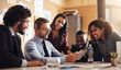 © StarDweller/peopleimages.com - Business, meeting and male leader with tablet for innovation, new software or company development in office. Smile, diversity or man with tech for strategy, brainstorming or corporate success in team