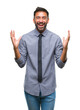 © Krakenimages.com - Adult hispanic business man over isolated background celebrating crazy and amazed for success with arms raised and open eyes screaming excited. Winner concept