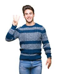 Wall Mural - Young handsome man over isolated background showing and pointing up with fingers number three while smiling confident and happy.