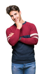 Sticker - Young handsome man over isolated background looking confident at the camera with smile with crossed arms and hand raised on chin. Thinking positive.