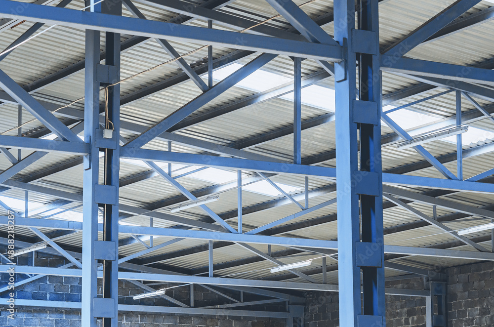 Metal trusses of ceiling of an industrial shop