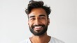 © Johannes - portrait of an attractive indian male in his 30s with a beard smile and looking into the camera isolated against a white background