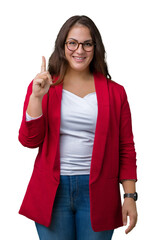 Wall Mural - Beautiful plus size young business woman wearing elegant jacket and glasses over isolated background showing and pointing up with finger number one while smiling confident and happy.