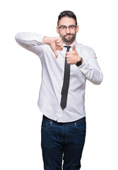 Sticker - Young handsome business man wearing glasses over isolated background Doing thumbs up and down, disagreement and agreement expression. Crazy conflict