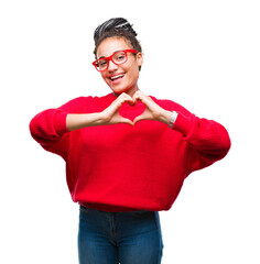 Poster - Young braided hair african american girl wearing sweater and glasses over isolated background smiling in love showing heart symbol and shape with hands. Romantic concept.