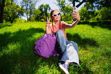 Sticker - Full size photo of lovely little girl v-sign selfie photo sunglass schoolgirl summer play outside good mood free time weekend outdoors