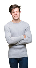 Sticker - Young handsome man wearing winter sweater over isolated background happy face smiling with crossed arms looking at the camera. Positive person.