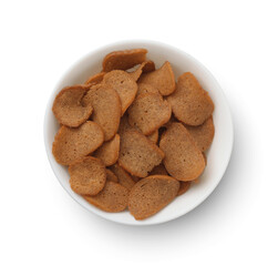 Top view of rye bread chips in ceramic bowl