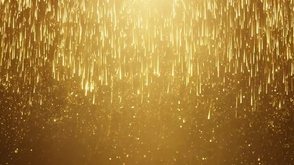 Leinwandbilder - Golden glitter falls like rain on a dark background.