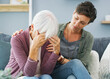 © Daniel L�/peopleimages.com - Elderly mom, stress and daughter with support for mental health crisis, compassion and dementia in home. Senior mother, sad and woman with empathy for retirement debt, kindness and financial mistake
