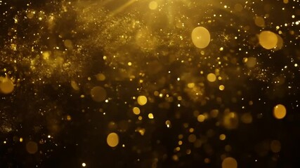 Leinwandbilder - Golden glitter falls against a dark background, creating a sparkling effect.