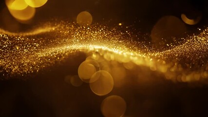 Leinwandbilder - A wave of gold glitter is illuminated with soft, blurred golden lights, creating a sparkling and ethereal effect.
