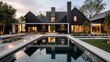 © Salman - modern suburban farmhouse with a dramatic black exterior and contrasting white trim, surrounded by minimalist landscaping and a sleek, reflective pool