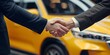 © keiron - Car salesman shaking hands with customer after successful sale, dealership automobile purchase