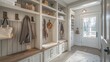 © Salman - Suburban farmhouse entryway with a custom mudroom featuring built-in storage, hooks for coats, and a bench for shoe removal