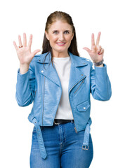 Poster - Beautiful middle age mature woman wearing fashion leather jacket over isolated background showing and pointing up with fingers number eight while smiling confident and happy.