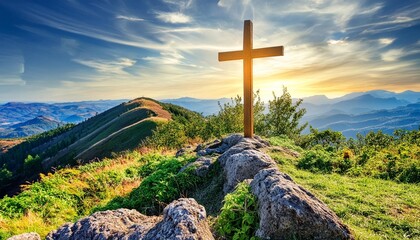 Wall Mural - christian cross on top rock mountain with bright sunbeam on the colorful sky background christian background concept