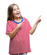 © Krakenimages.com - Young beautiful girl over isolated background smiling and looking at the camera pointing with two hands and fingers to the side.