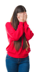 Canvas Print - Young Chinese woman over isolated background wearing glasses with sad expression covering face with hands while crying. Depression concept.