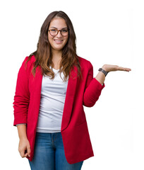 Wall Mural - Beautiful plus size young business woman wearing elegant jacket and glasses over isolated background smiling cheerful presenting and pointing with palm of hand looking at the camera.