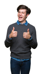 Sticker - Young handsome elegant man over isolated background success sign doing positive gesture with hand, thumbs up smiling and happy. Looking at the camera with cheerful expression, winner gesture.