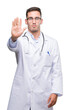 © Krakenimages.com - Handsome young doctor man doing stop sing with palm of the hand. Warning expression with negative and serious gesture on the face.