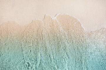 Poster - Sea waves rolling on beautiful sandy beach, top view. Summer vacation