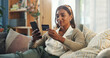© WesSide/peopleimages.com - Cellphone, credit card and indian woman on sofa for ecommerce, purchase and online buying in home. Living room, fintech and internet investment on mobile app, female person and stocks for finance