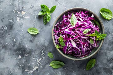 Poster - Purple cabbage salad in a bowl top view on gray background