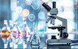 © suntorn - microscope with lab glassware, science laboratory research and development concept