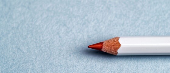 Wall Mural -  A red pencil, with a white eraser at its tip's end