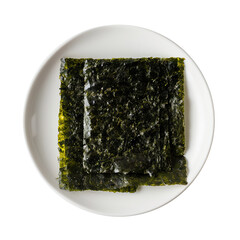 flat lay photograph of nori roasted seaweed sheets  on a white plate isolated