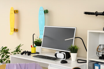 Sticker - Teenager's workplace with modern gadgets and plants in room