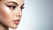 © Graphic Master - Chic woman with a sleek eyeliner look, demonstrating her beauty routine