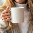 © S A F I Y A - Woman Holding White Ceramic Mug Close-Up