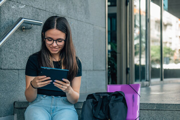 Wall Mural - young student with digital tablet on university stairs