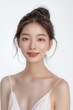 © Deea88 - An asian beauty model smile pose in front of a white background