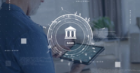 Wall Mural - Image of bank sign, network and data processing over caucasian man using laptop