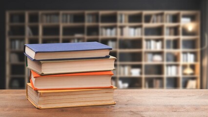 Wall Mural - stack of books in library on wooden table