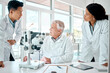 © peopleimages.com - Science, team and people with discussion in laboratory for medical research, consulting and solution. Scientist, microscope and employee with conversation for vaccine study, support or clinical trial