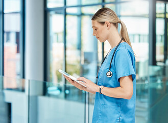Poster - Tablet, woman and typing of nurse, clinic and online for telehealth, reading and internship for person. Hospital, medical research and employee with stethoscope for healthcare, wellness and app