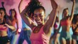 © Lakkhana - A group of people doing a dance fitness class, moving to the beat and having fun while working out