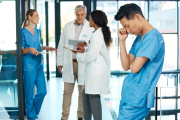 Wall Mural - Stress, tired nurse and man in clinic with insomnia, burnout or exhausted with coworkers. Fatigue, sleepy and overworked medical surgeon with boredom, deadline or sick worker in healthcare hospital