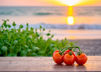 Wall Mural - Fresh Tomatoes on Wooden Plank at Sunset Beach.