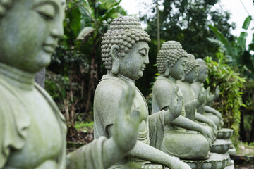 Stone buddha statue, close up. Buddhism.