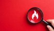 © ytemha34 - Magnifying glass with flame icon. Fire surveillance inspection and fire fighting concept.