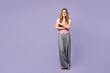 © ViDi Studio - Full body young confident happy fun employee business woman corporate lawyer wear classic suit vest white t-shirt glasses work in office hold hands crossed folded isolated on plain purple background.