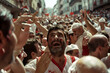 © artesenc - The San Fermin running of the bulls between people and bulls in Pamplona in Spain