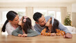 © Courtney/peopleimages.com - Bonding, parents and children in kitchen, kiss and love of family, affection and dad with care for daughter. Siblings, mother and father with kids, woman and man in house, break and together in home